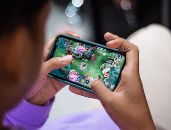 person playing a game on a smartphone